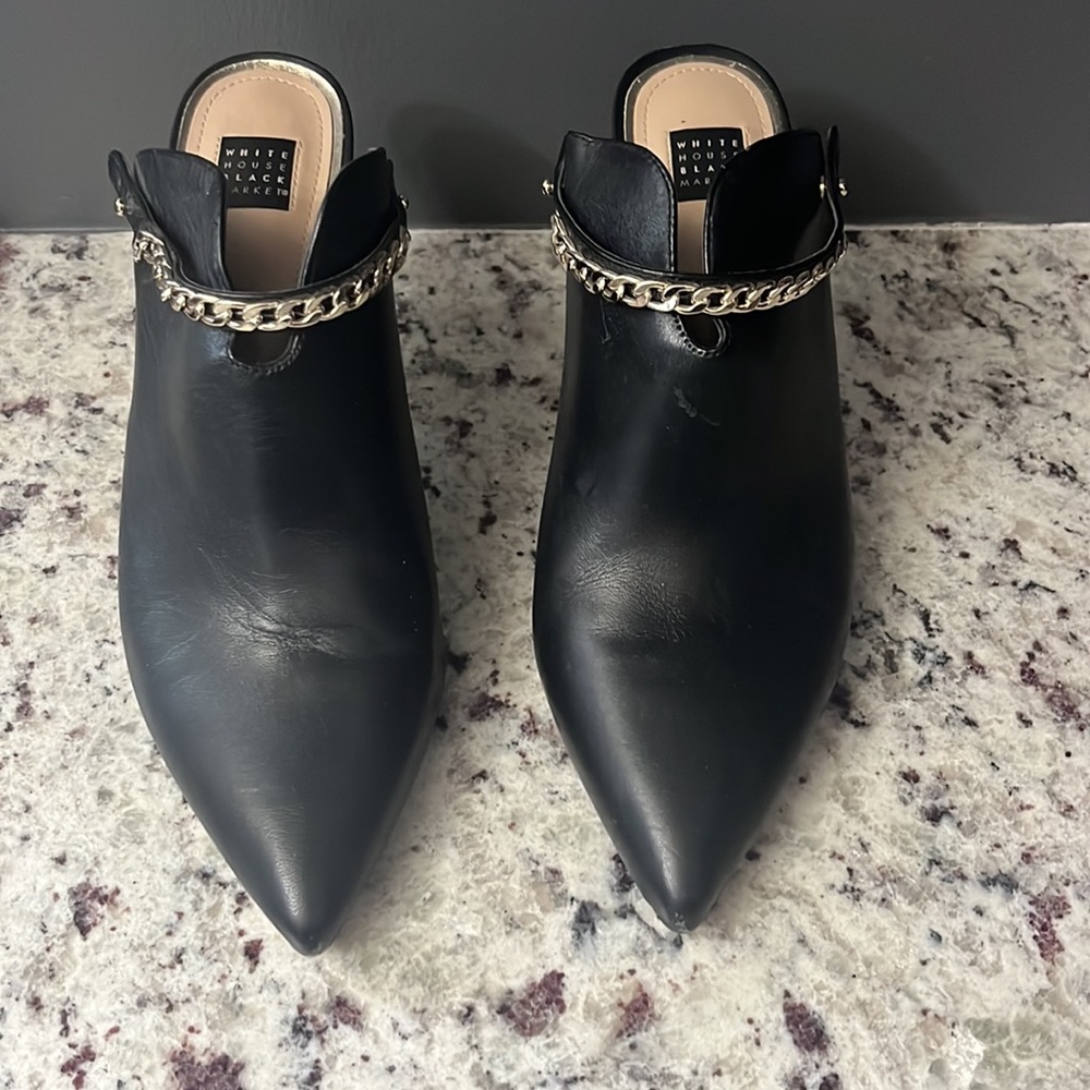 White House Black Market black high heels with adjustable strap. Gold chain.